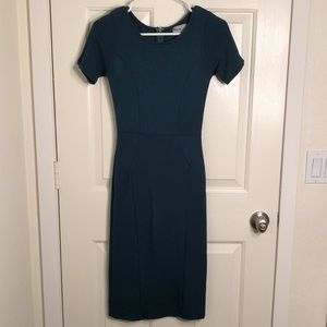 Unique Vintage 1960s style teal wiggle dress